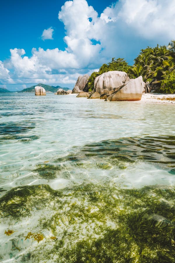 Anse Source d`Argent tropical beach with huge granite boulders on La Digue Island, Seychelles. Anse Source d`Argent tropical beach with huge granite boulders on La Digue Island, Seychelles.