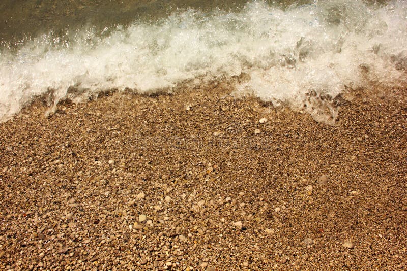 Spiaggia un giorno di estate E fotografie stock libere da diritti Spiaggia un giorno di estate E fotografie stock libere da diritti
