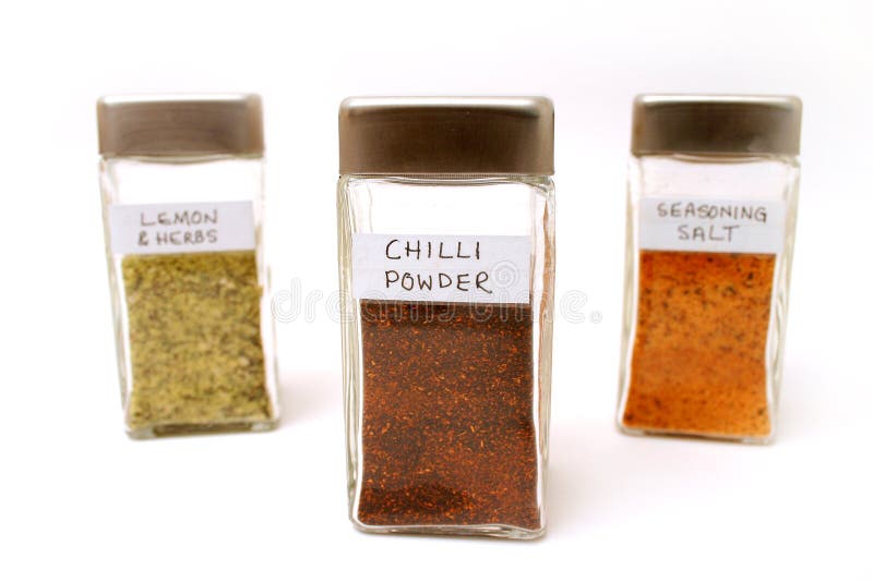 Spice bottles 2 stock photo. Image of grind, bottles, ground 155380