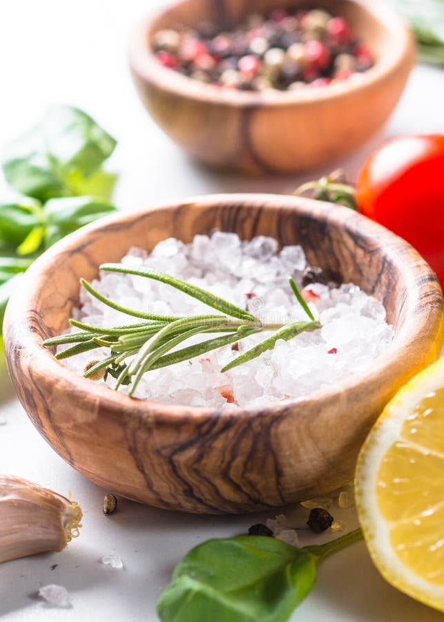 Spices, herbs and olive oil over white stone table. stock images Spices, herbs and olive oil over white stone table. stock images