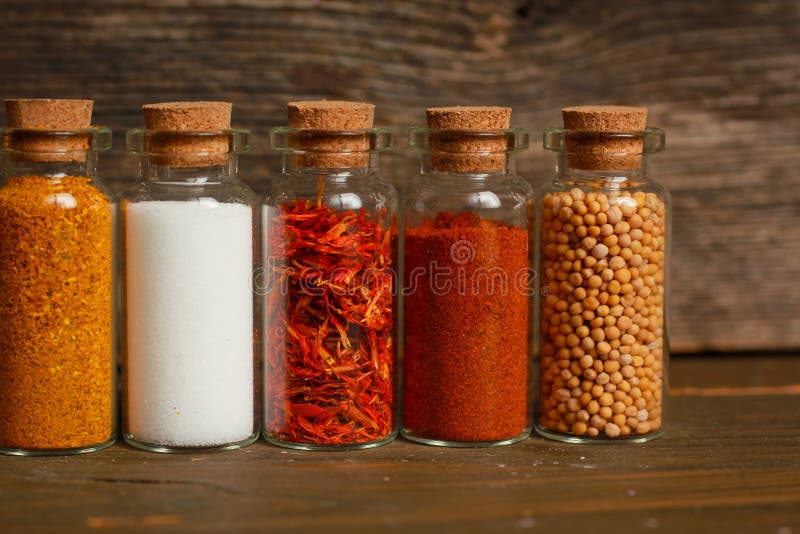 Spices, herbs and seeds stock image. Image of curry, container 37383857