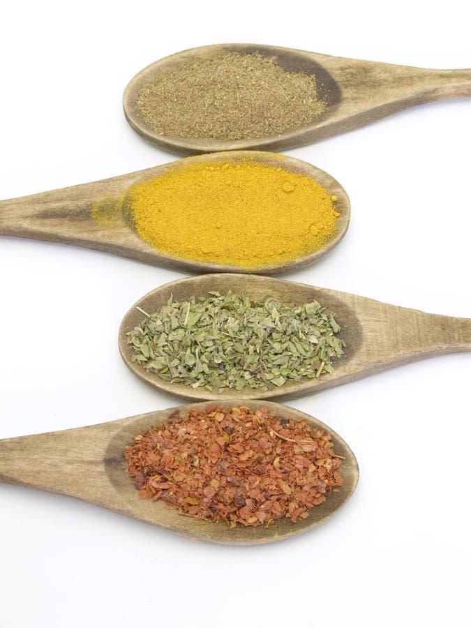 Spices in wood spoons