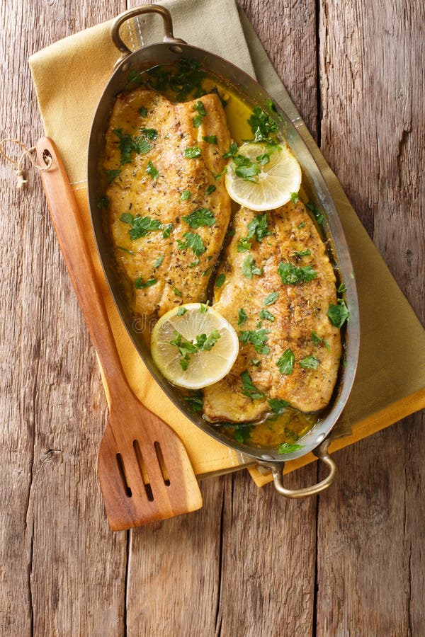 Spicy Trout Fillet with Garlic Lemon Butter Sauce, Tomatoes and Stock