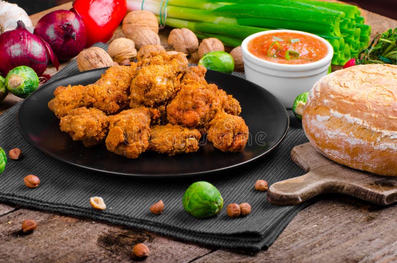 Spicy Breaded Chicken Wings with Homemade Bread Stock Photo Image of