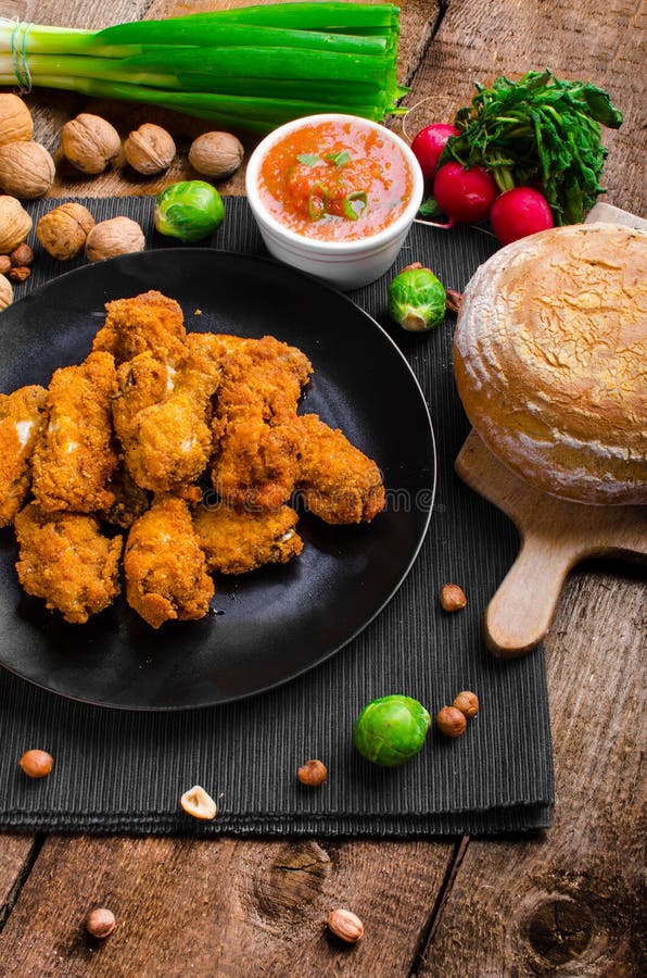Spicy Breaded Chicken Wings with Homemade Bread Stock Image Image of