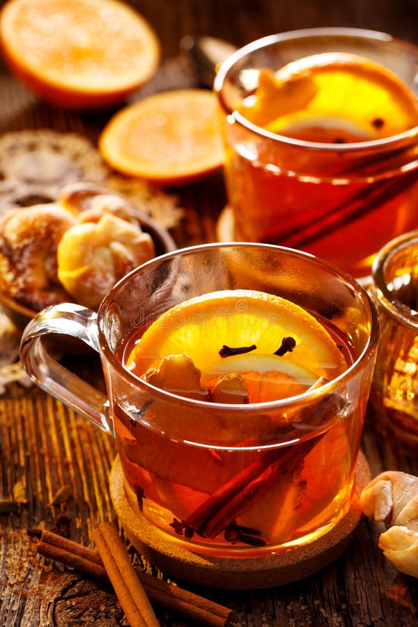 Spicy Citrus Hot Tea with Ginger, Cloves, Cinnamon and Orange Slices ...