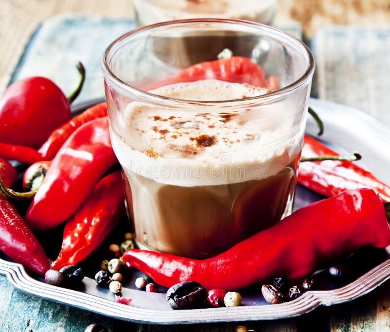 Spicy Coffee with Chili Peppers Stock Photo - Image of flavoring, brown ...