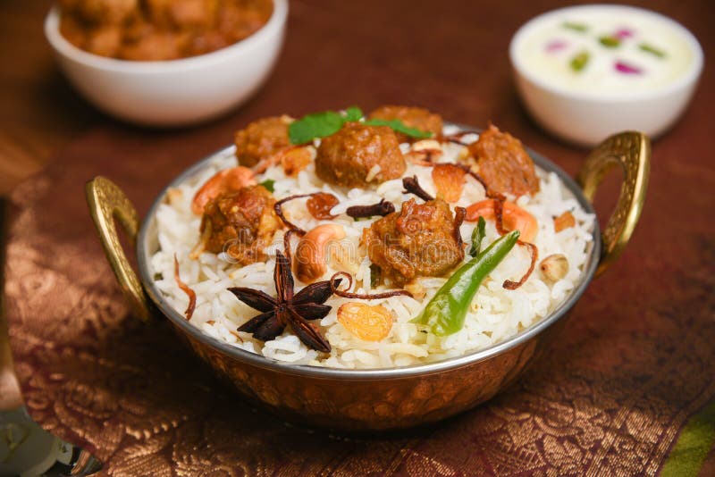Veg biryani or soya dum biryani ,Soya Chunks Pulao and raita. Basmati rice popular festival Lankan food Sri Lanka. Lankan food. Spicy Indian Malabar biriyani or Hydrabadi biryani, Dum Biriyani, pulao, pulav, pilaf, basmati rice, spicy mixed rice dish with meat curry for Ramadan Kareem, Eid Hyderabad India. Chicken dum biryani stock images, royalty-free photos and pictures