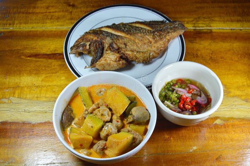 Spicy Pumpkin in Coconut Cream Curry and Deep Fried Mango Fish Stock