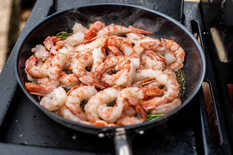 Spicy Shrimps on Pan with Garlic, Coriander and Peppers Stock Photo
