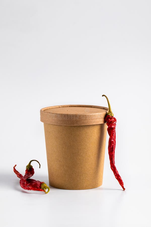 Download Spicy Soup To Go In A Craft Container With Red Pepper On A ...
