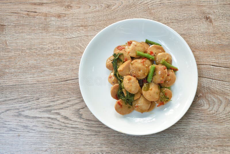 Spicy Stir Fried Slice Pork Meatball with Yard Long Bean and Basil Leaf