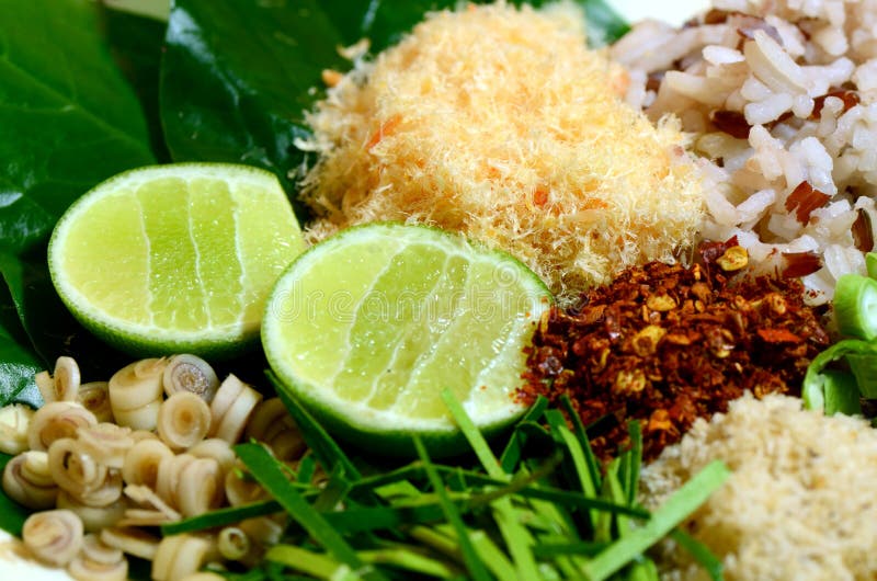 Spicy Thai Khao Yam. Thai Khao Yam in Southern Style. A kind of rice salad with plenty of vegetable dressing with special salad dressing called stock images