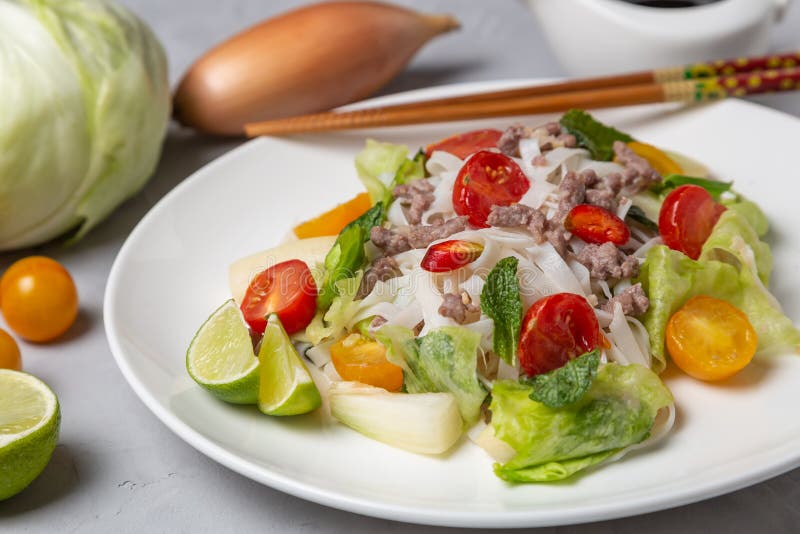 Spicy Thai Salad with Ground Beef and Rice Noodles. Yam Woon Sen Stock