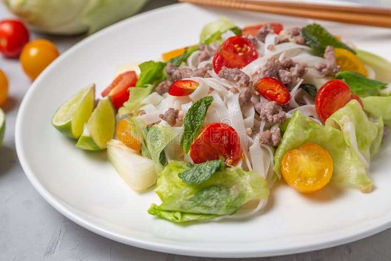 Spicy Thai Salad with Ground Beef and Rice Noodles. Yam Woon Sen Stock