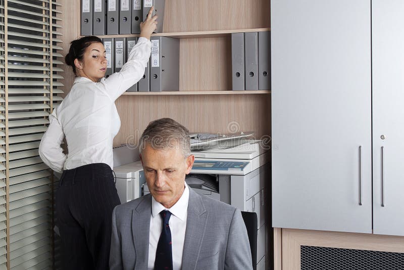 Spies in the company royalty free stock image