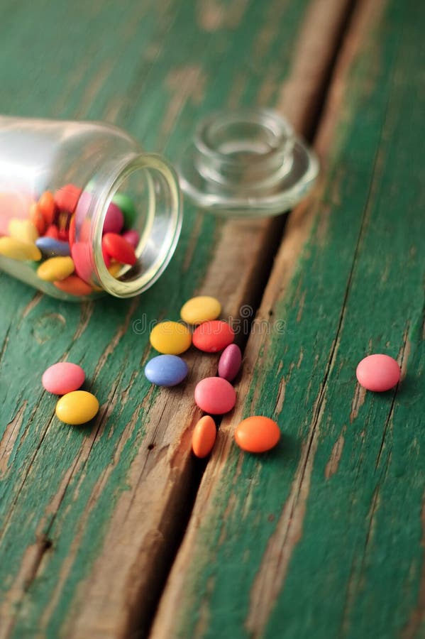 Spilled Chocolate Smarties from Glass Dose Stock Image - Image of ...