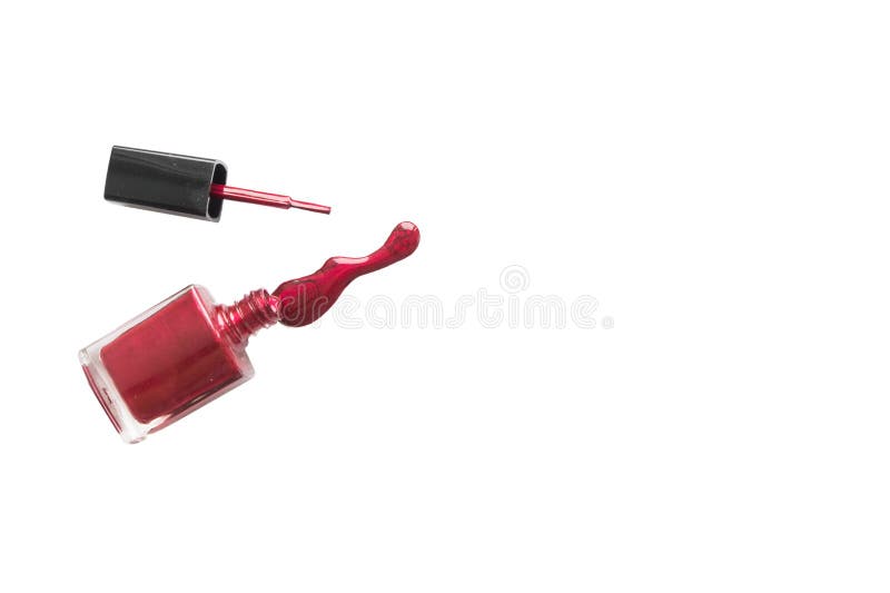 Spilled Nail Polish and Bottle on White Background. Drops of Liquid