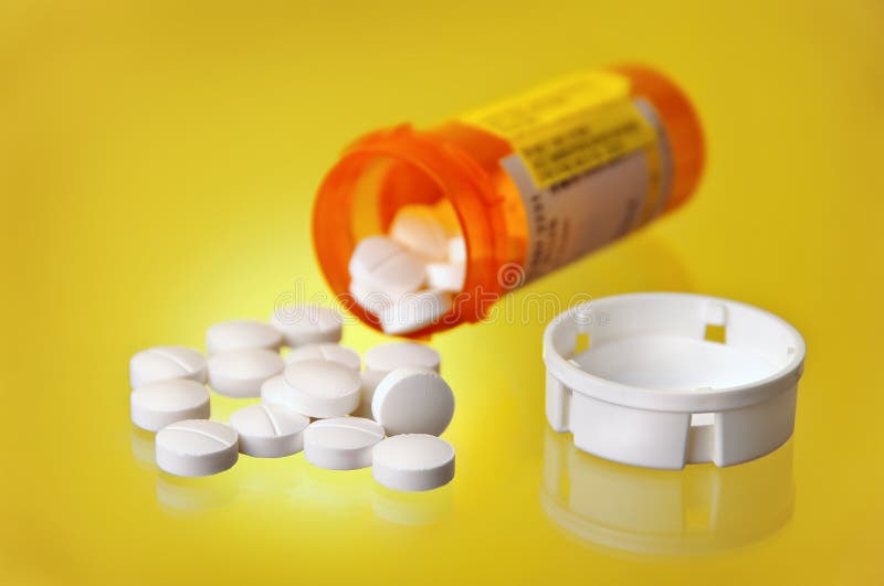 Spilled Prescription Medication Orange Pill Bottle