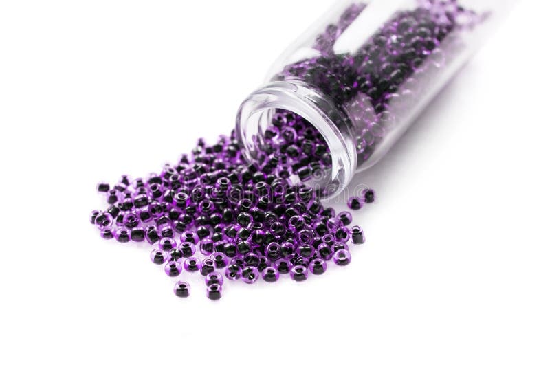 https://thumbs.dreamstime.com/b/spilled-violet-beads-some-glass-out-glass-jar-white-background-closeup-35813306.jpg