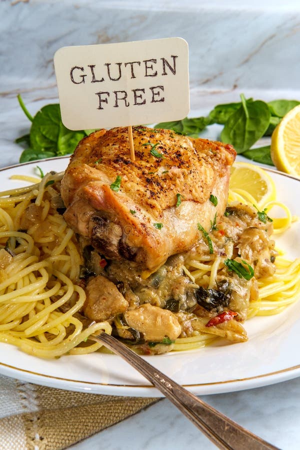 Spinach Artichoke Chicken Thighs Stock Photo - Image of sauce, lemon