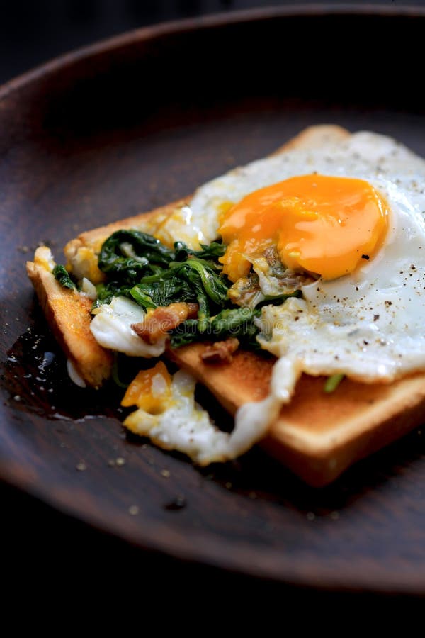 Spinach egg on toast stock image. Image of toast, cuisine 26310973