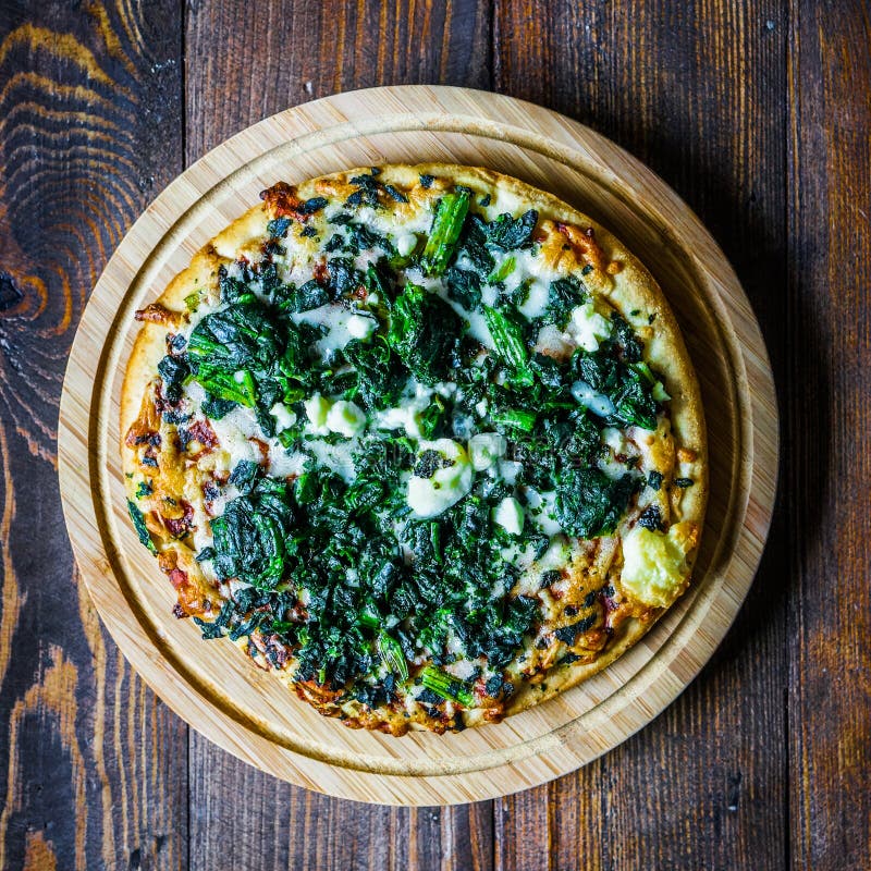 Spinach and Goat Cheese Pizza on Wooden Background Stock Image Image