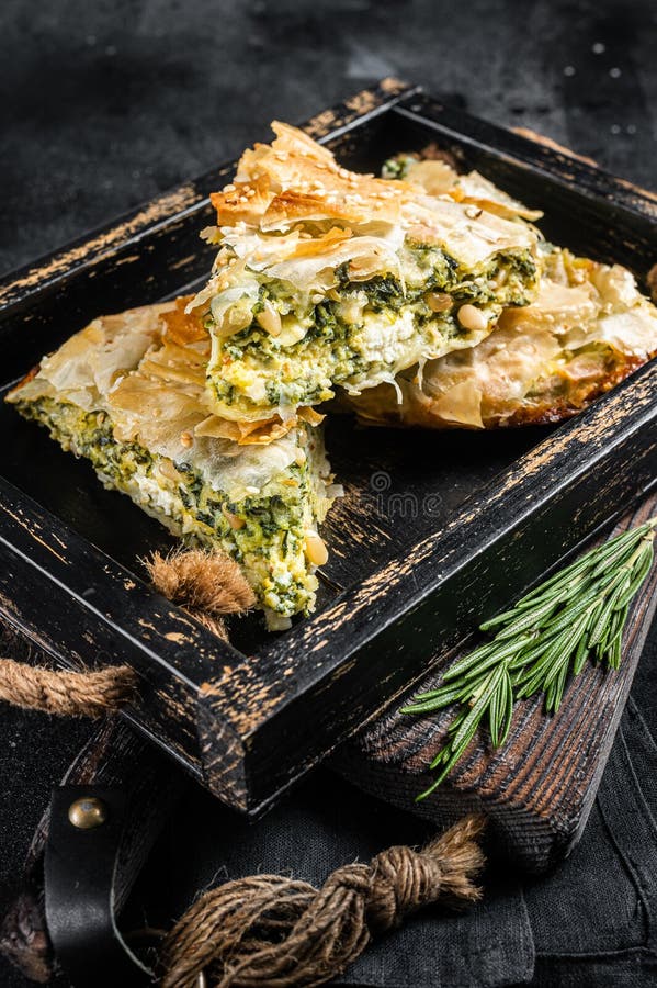 Spinach Pie Pieces, Spanakopita Greek Pie in Wooden Tray. Black ...