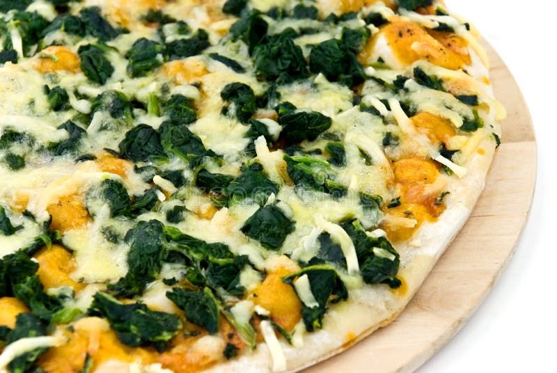 A spinach pizza with mozzarella cheese,spices