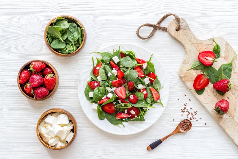 Spinach Salad with Strawberry and Goat Cheese, Top View Stock Photo