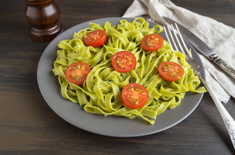 Spinach Tagliatelle with Cherry Tomatoes. Stock Image - Image of ...