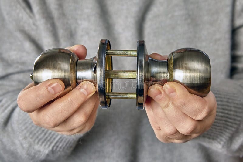 Mechanism with a Spindle from a New Brass Door Handle with a Latch and