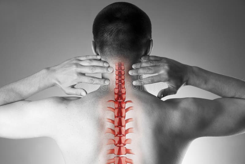 Spine pain, man with backache and ache in the neck, black and white photo with red backbone royalty free stock photo
