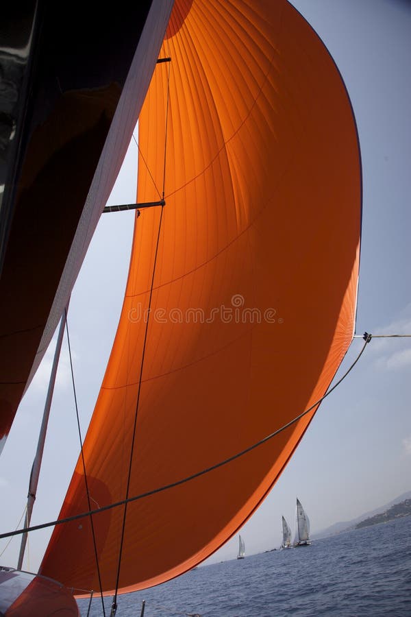 Orange spinnaker in the wind. Giraglia Rolex Cup regatta 2009. Orange spinnaker in the wind. Giraglia Rolex Cup regatta 2009.