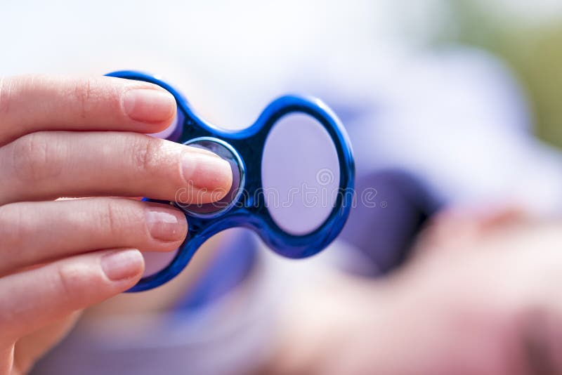 Spinner toy in the hand royalty free stock photos Spinner toy in the hand royalty free stock photos