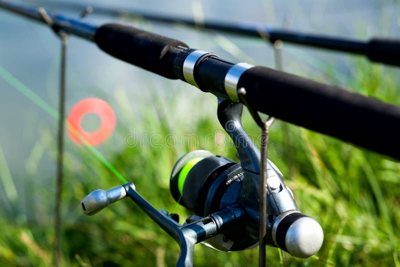 Fishing Rods with Spinning Reels Editorial Stock Image Image of blue