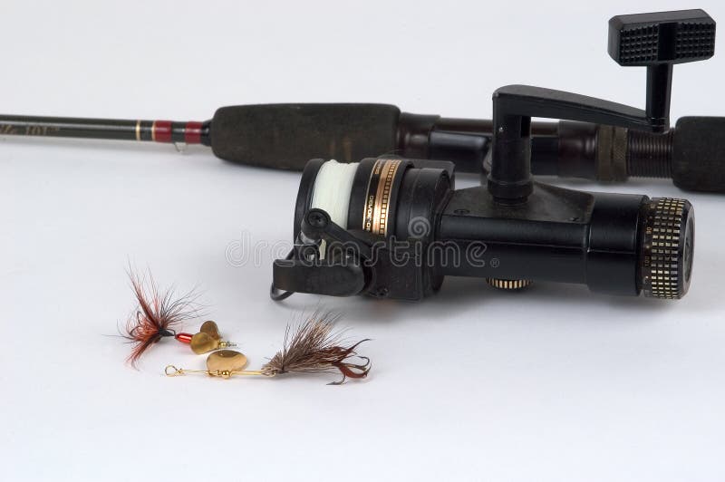 Spinning reel and lures stock image. Image of fishing, monofilament 8165
