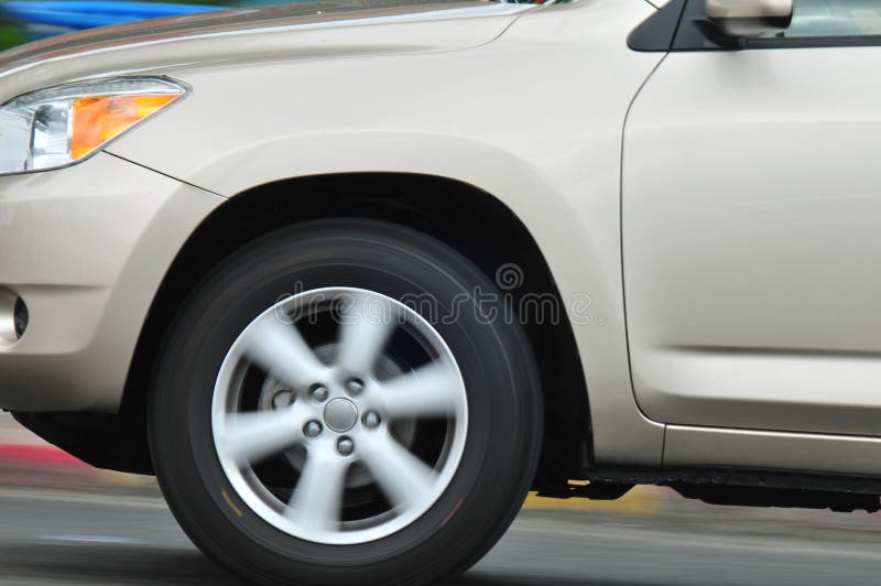 Spinning Wheels stock image. Image of automotive, auto 9902145