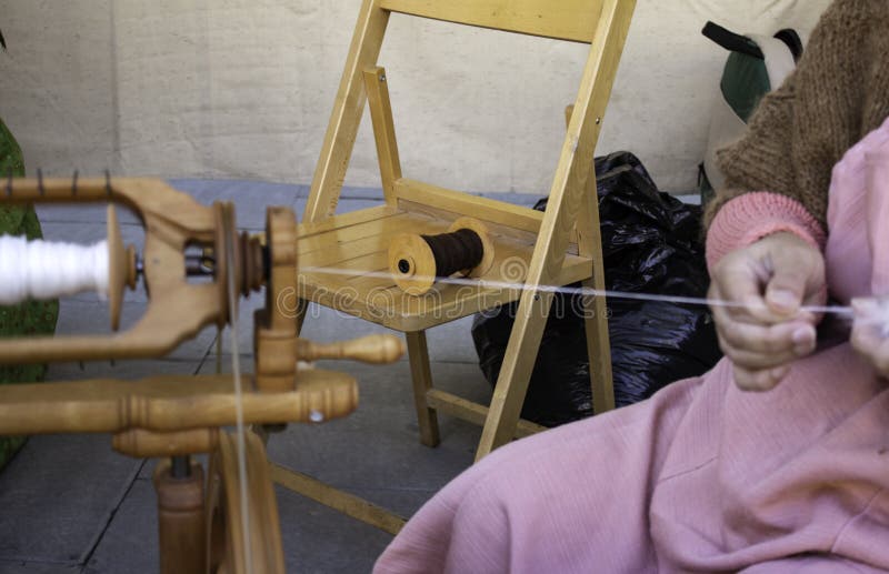 Spinning Wool on Spinning Wheel Stock Image - Image of hand