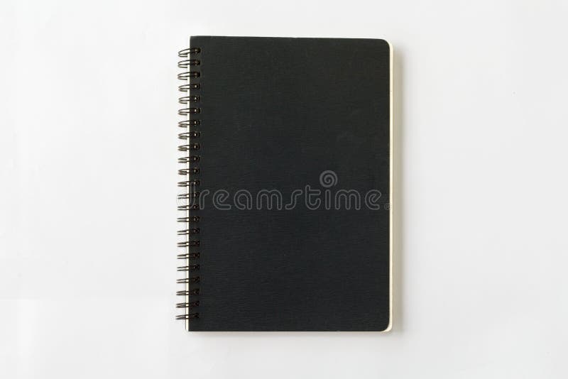 Spiral black notebook on white background stock photography