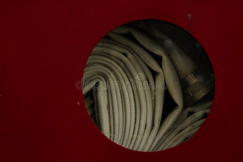 Spiral hydrant hose royalty free stock photography