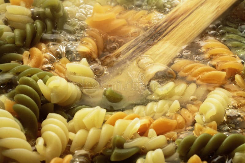 Spiral Pasta in Boiling Hot Water Stock Photo Image of water