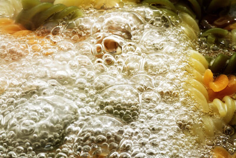 Spiral Pasta in Boiling Hot Water Stock Photo Image of water