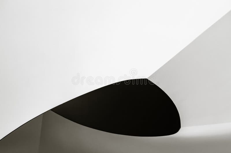 Spiral staircase. Abstract modern architecture. Black and white closeup photo of interior fragment with metaphorical relation to