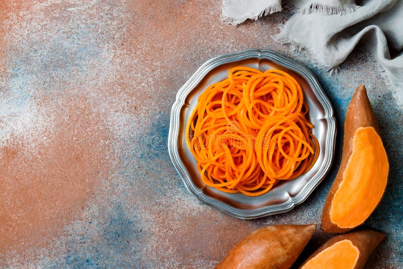 https://thumbs.dreamstime.com/b/spiralized-sweet-potato-spaghetti-low-carb-vegetable-pasta-cooking-130766299.jpg