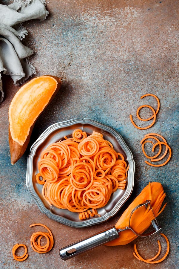 https://thumbs.dreamstime.com/b/spiralized-sweet-potato-spaghetti-low-carb-vegetable-pasta-cooking-spiralized-sweet-potato-spaghetti-low-carb-vegetable-pasta-130766390.jpg