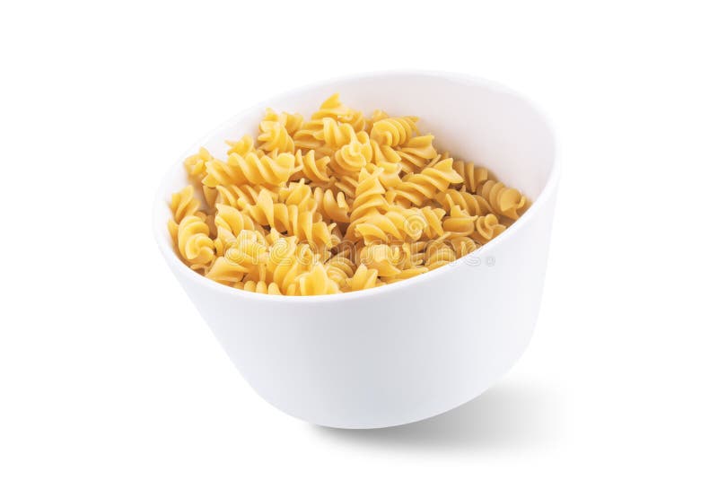 Spirals dried pasta on a white isolated background royalty free stock photos