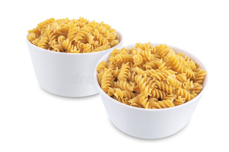 Spirals dried pasta on a white isolated background royalty free stock images