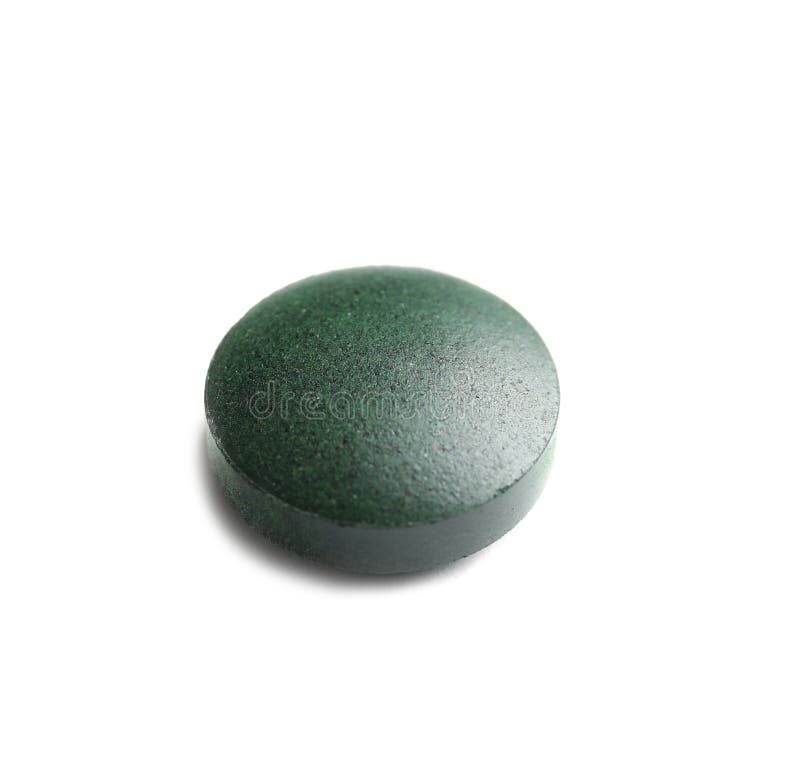 Spirulina tablet on white background.