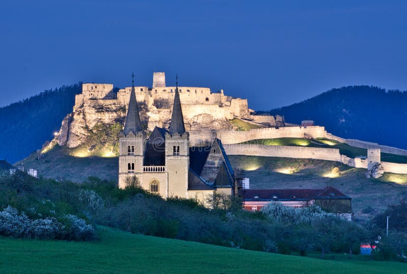 Spissky hrad castle and Spisska Kapitula in the evening